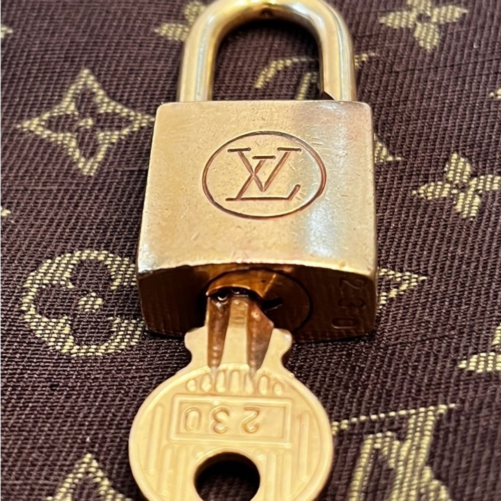 Louis Vuitton Gold Padlock with Key